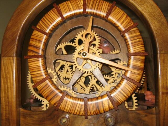 rabbit hiding behind a clock